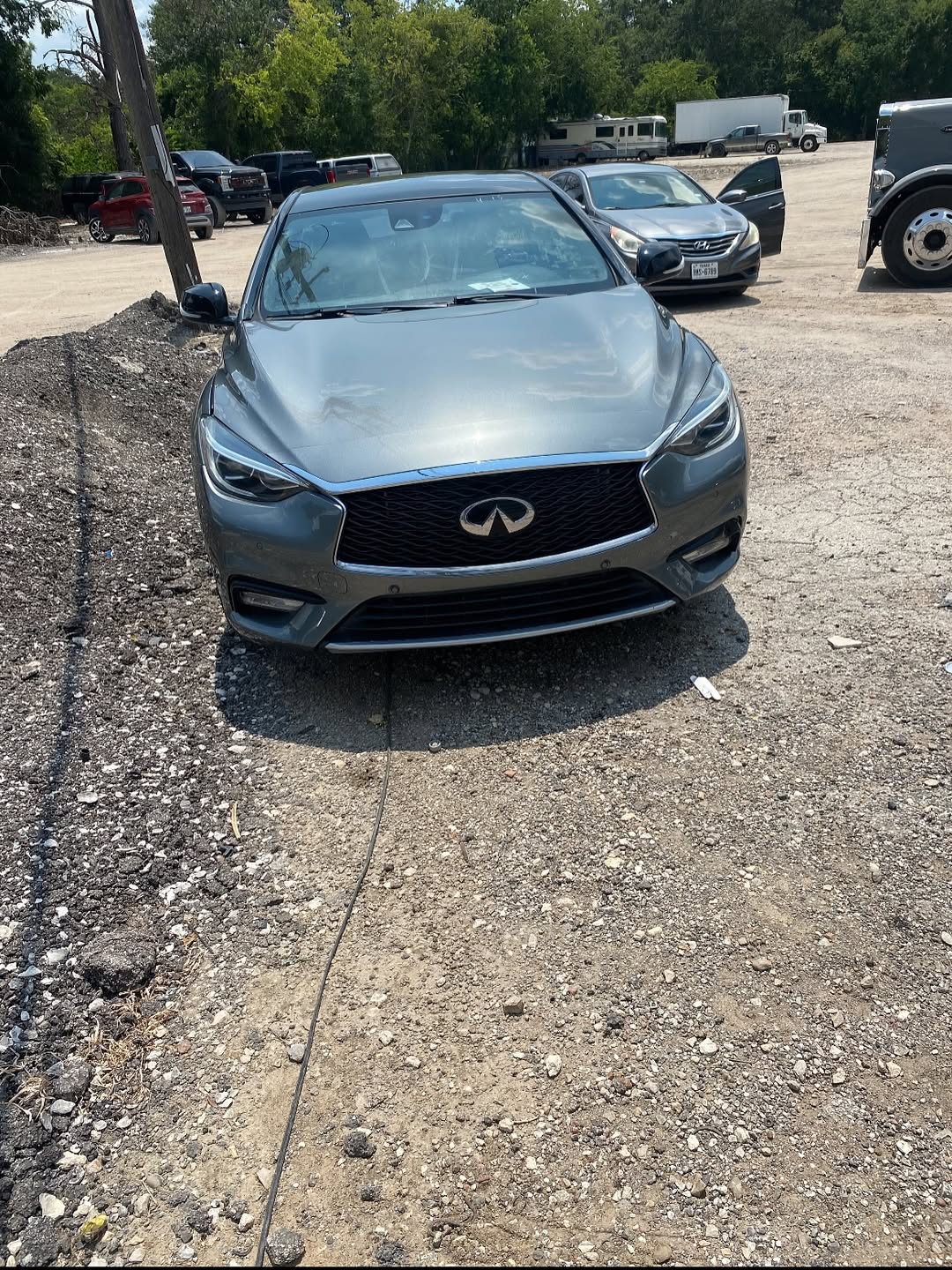 Infiniti after repair — front end fully restored to pre-accident condition
